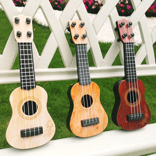 Børns musikalsk legetøjsinstrument simulering mini fire-strenget guitar legetøj musik uddannelsesmæssigt instrument gul