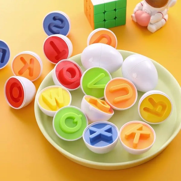 Montessori ABC -löytömuna: 26-osainen interaktiivinen aakkos- ja muodonlajittelija