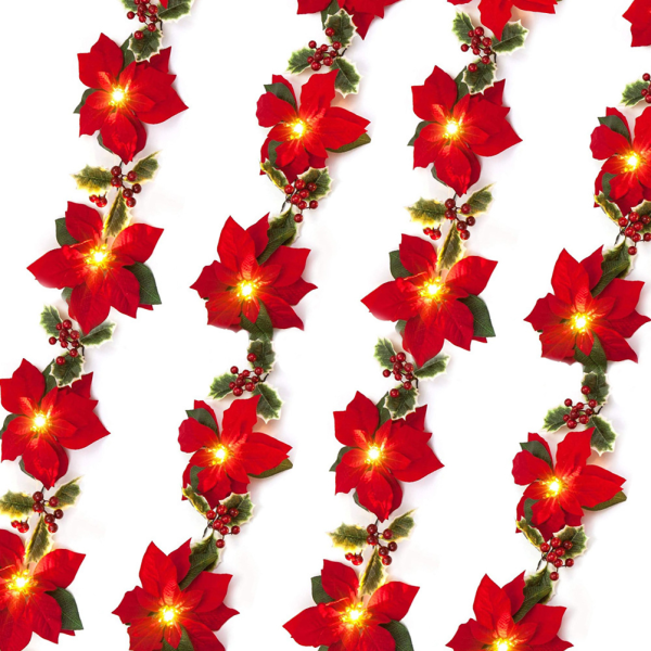Julepynt med juleblomster og lyskæder
