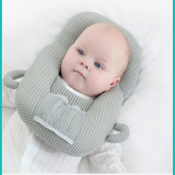 Avtakbar pustende baby pute med flaskeholder