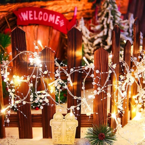 Indoor Christmas decoration, holiday lights, white berries