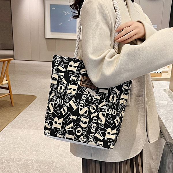Sort Canvas Shoppingtaske - Stilren & Rummelig Tote