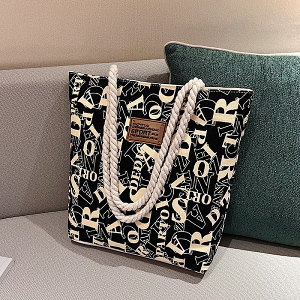 Sort Canvas Shoppingtaske - Stilren & Rummelig Tote