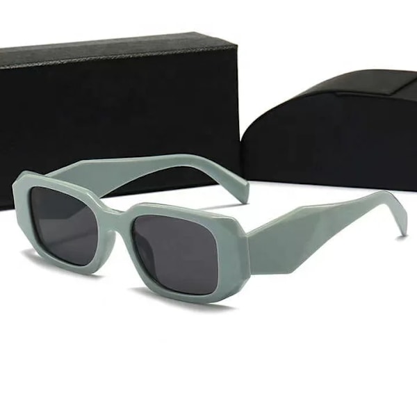 Topp 2024 nya lyxiga varumärkes pra dam designer solglasögon mode uv-skydd glasögon för män kvinna glas med förpackning Green with logo