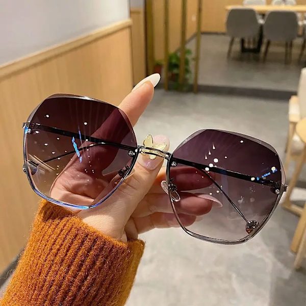 Uuden tyylin epäsäännöllisen muotoinen muodikkaat aurinkolasit Gradient Kehyksetön Aurinkolasit Ylisuuret tyylikkäät metallikehyksiset naisten aurinkolasit D7-Tea brown Fashion Sunglasses