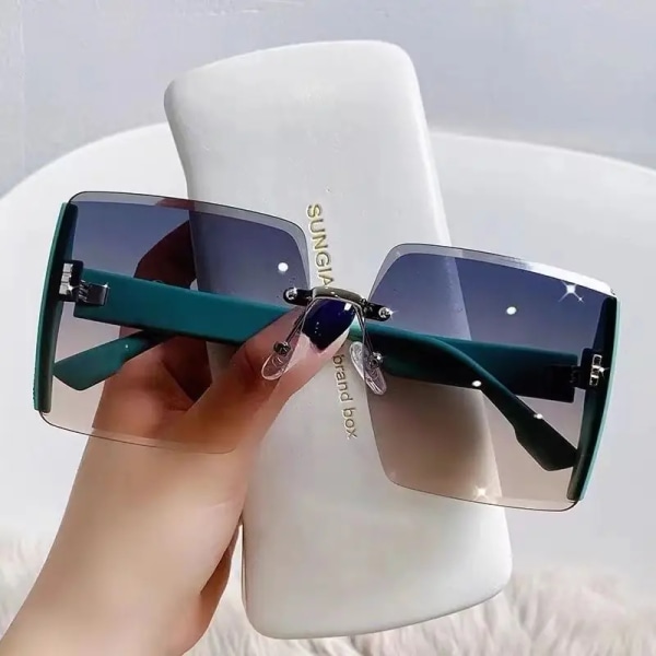 2024 Hot  Women Bling Trendy Rimless Sunglasses in Bulk Factory Direct Wholesale from China