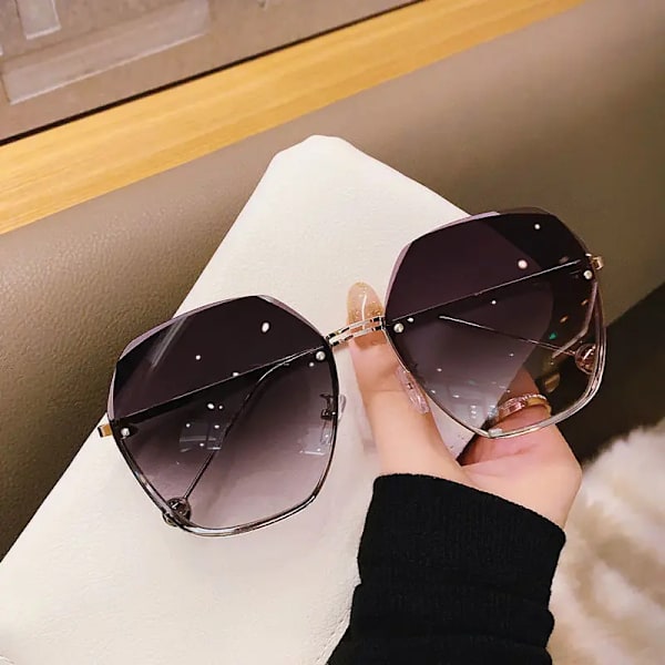 Uuden tyylin epäsäännöllisen muotoinen muodikkaat aurinkolasit Gradient Kehyksetön Aurinkolasit Ylisuuret tyylikkäät metallikehyksiset naisten aurinkolasit D7-Tea brown Fashion Sunglasses