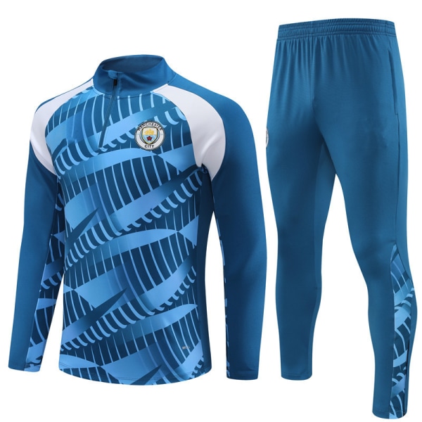 23-24 Manchester City Hjemmebanetrøje Nr. 17 De Bruyne Foden Nr. 9 Haaland Langærmet Sæt til Børn og Voksne Blå Camouflage blue camouflage L