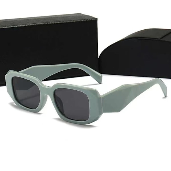 Topp 2024 nya lyxiga varumärkes pra dam designer solglasögon mode uv-skydd glasögon för män kvinna glas med förpackning Green with logo
