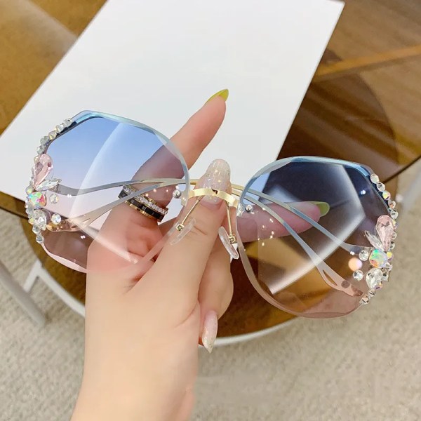 2024 Vuoden ylelliset muotisuunnittelijat räätälöivät 2024 aurinkolasit naisten sävyt reunattomat leikkauslinssit aurinkolasit timanttiaurinkolasit C4 Fashion Sunglasses