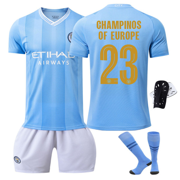 2023-24 Manchester City Championship Commemorative Edition New Font Gold No. 23 CHAMPIONS Set hemma och borta fotbollströja Home No. 23 belt + gear M