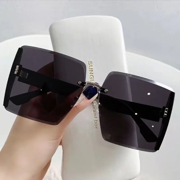 2024 Hot  Women Bling Trendy Rimless Sunglasses in Bulk Factory Direct Wholesale from China