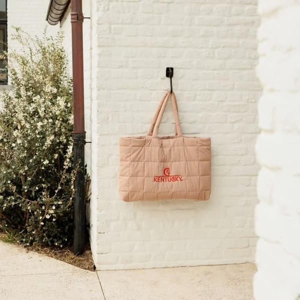 Kuddad sadel Kentucky Horsewear-logotyp beige