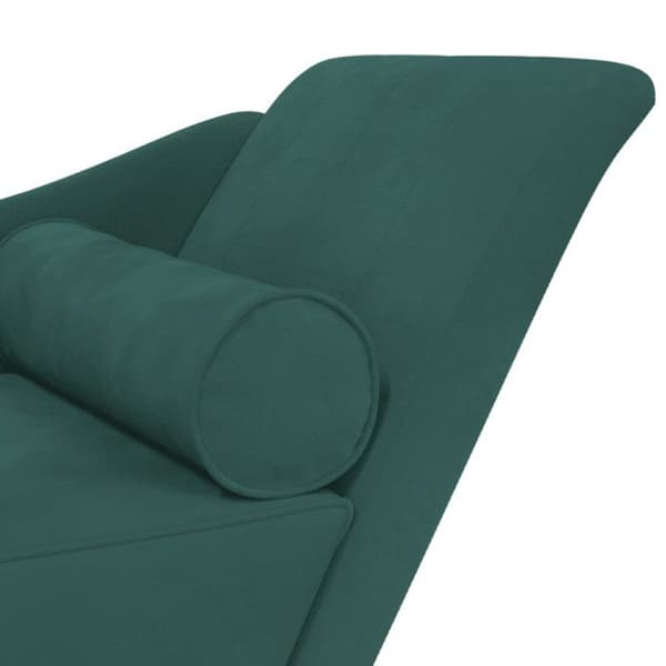 Soffa med mörkgrön sammetskuddar
