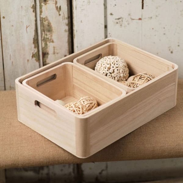 Set med tre korgar i trä beige