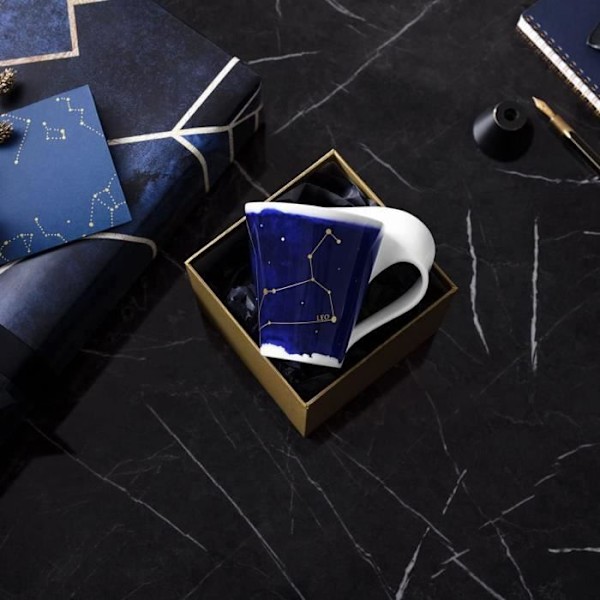 Mugg - Villeroy Boch - NewWave Stars - Premiumporslin - 300 ml - Motiv av lejon i guld Vit blå
