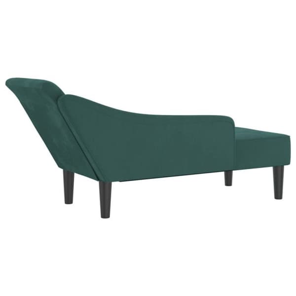 Soffa med mörkgrön sammetskuddar