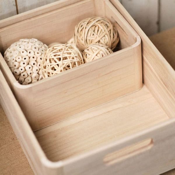 Set med tre korgar i trä beige