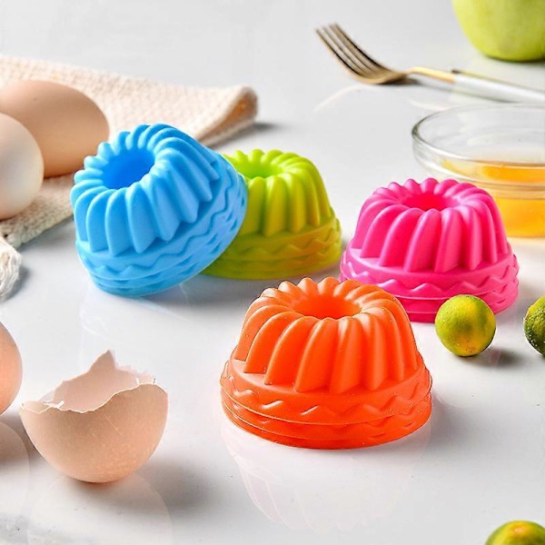 Pakke med 12 donut-formede kageforme, Mini Form, diameter 7 cm, skridsikker, varmebestandig, mikroovn-, fryser- og opvaskemaskine sikker.