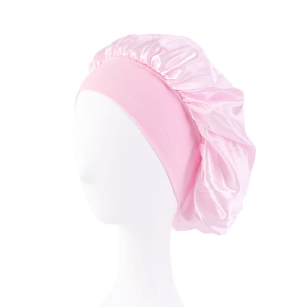 Ny sateng, solid bredbremmet sovehatt for kvinner Unisex-hodeinnpakning Elastisk båndhette Hårpleie Nattlue med panser Pink