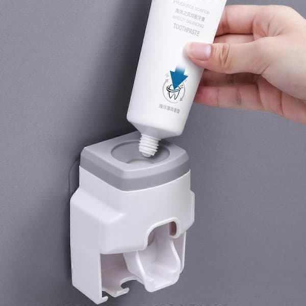 Tannkremdispenser og tannbørsteholder, veggmontert (grå)