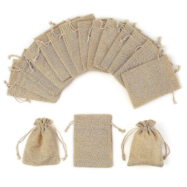 100 kpl juuttipussia häihin - syntymäpäiville - juhliin - vuosipäivään - vauvakutsuun - valmistujaisiin - etniseen - perinteiseen juuttipussiin - Koko: 10x14 CM