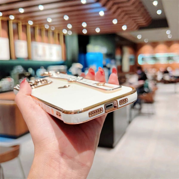 Søtt deksel til iPhone 15 Pro Max/ 15 Ultra, Søtt kjærlighets-hjerte for jenter/kvinner, luksuriøs platingkant, myk TPU støtsikkert deksel med håndleddsstroppstativ