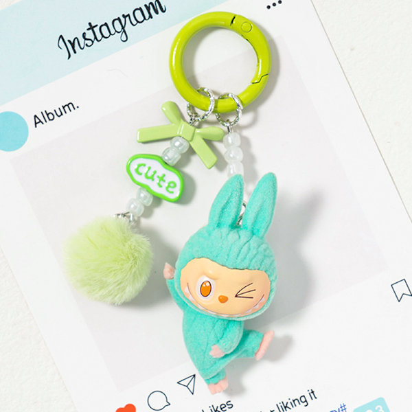 Söpö Mini Labubu Avaimenperä Sarjakuva Luova Kolmiulotteinen Nukke Opiskelijan Koululaukun Riipus Auton Avaimenperä Miehille ja Naisille Lahja ——MA Light pink