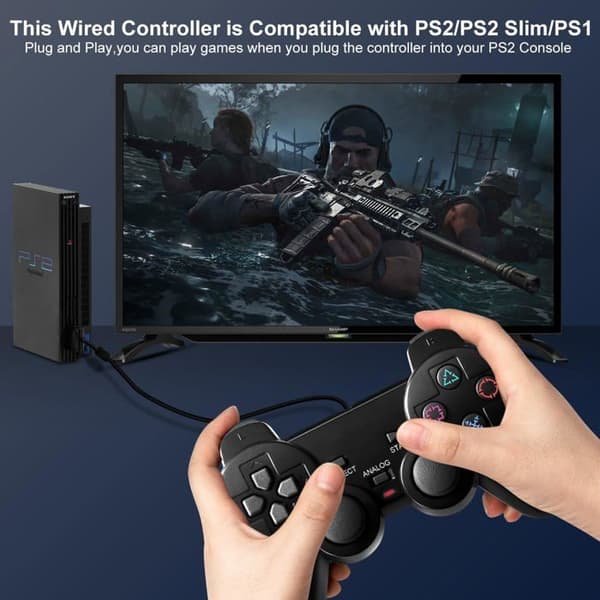 En kablet controller, kompatibel med PS2, med dobbelt vibration, et ergonomisk greb og et gaming-joystick.
