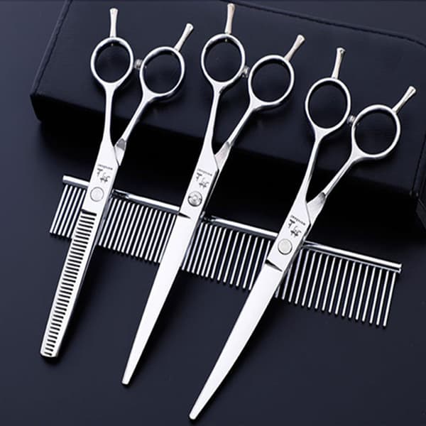 Dog Scissor Set with Thinning Shears, Curved Scissors, and Comb Silver