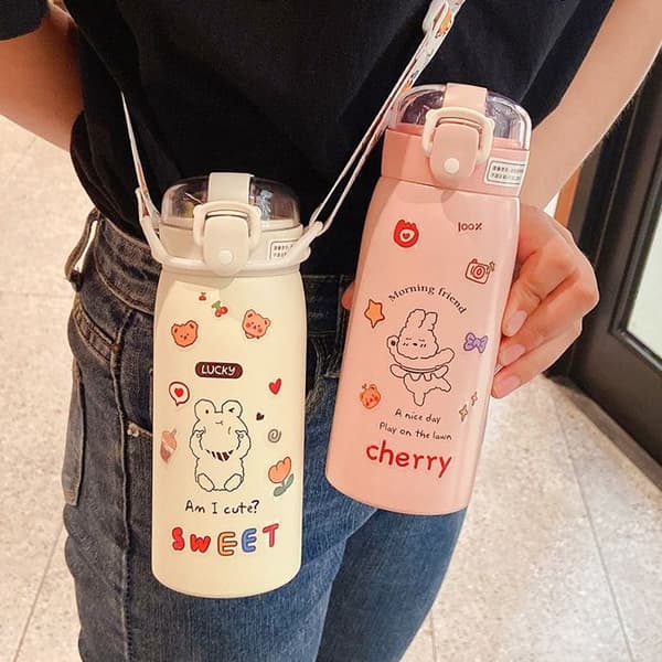 Water bottle/thermos mug with straw, cartoon design + random sticker + pink shoulder strap
