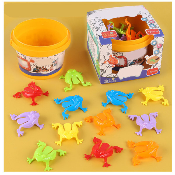 12 stk fargerike froskehoppende leker Finger Pressing Leaping Frogs med bøtte Kids Bouncing Toy Set Gaveeske Emballasje