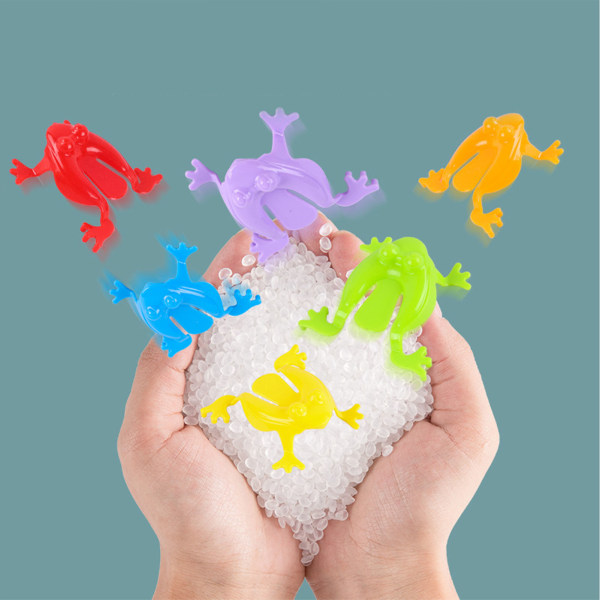 12 st färgglada hoppande grodleksaker Finger Pressing Leaping Frogs med hink Barn Studsande leksaksset Presentförpackning