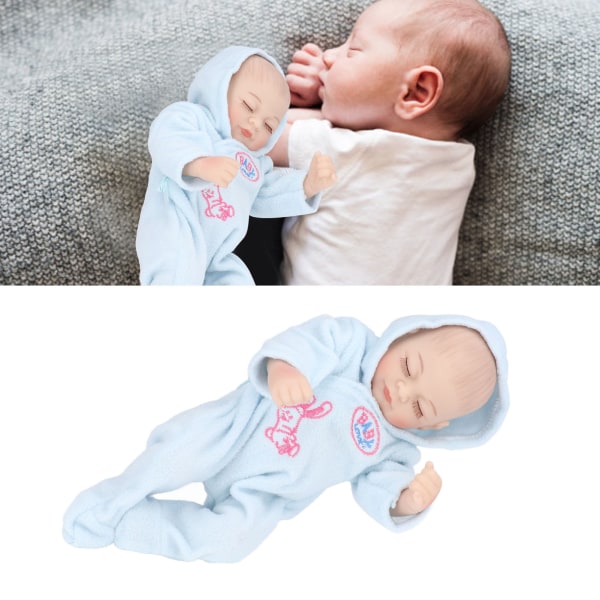 10 tum Reborn Dolls Mjuk silikon Delikat ansiktsdetaljer Tvättbar verklighetstrogen baby leksak med pyjamasBlå