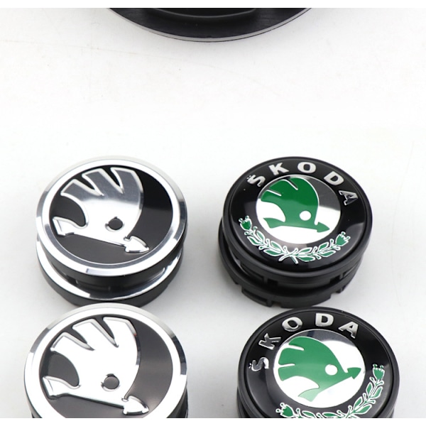 Passer til Skoda 57/56MM SKODA Xinrui Mingrui Hjulkapsel Billogo - Sølv Model (Fire Pak)