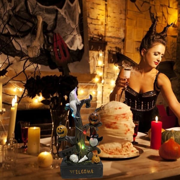 Halloween harpiks gren statue med græskar lys bord KLB