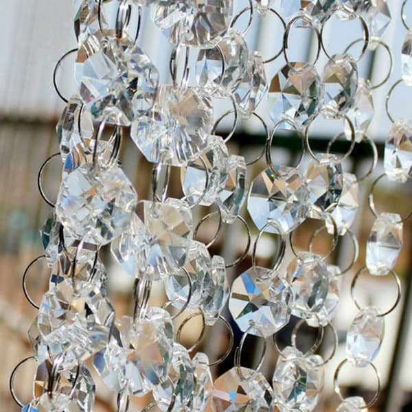 Transparent gardin med kristallpärlor