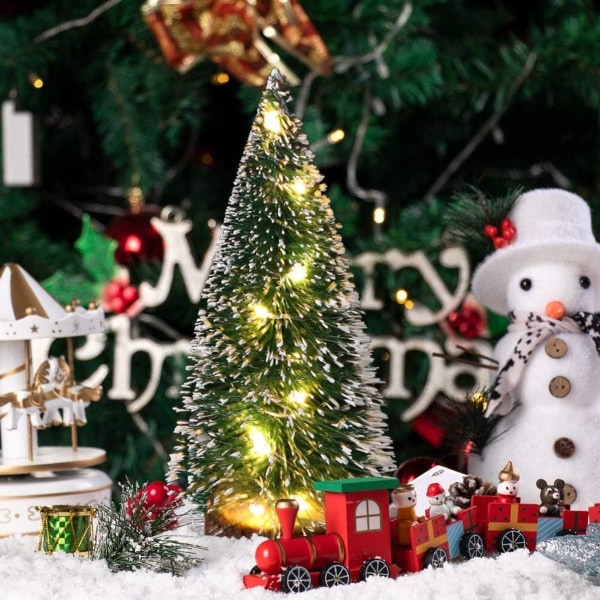 Miniatyyriset pöytäjoulukuuset, 6 kappaletta huurrettuja sisalpuita puualustalla, KLB