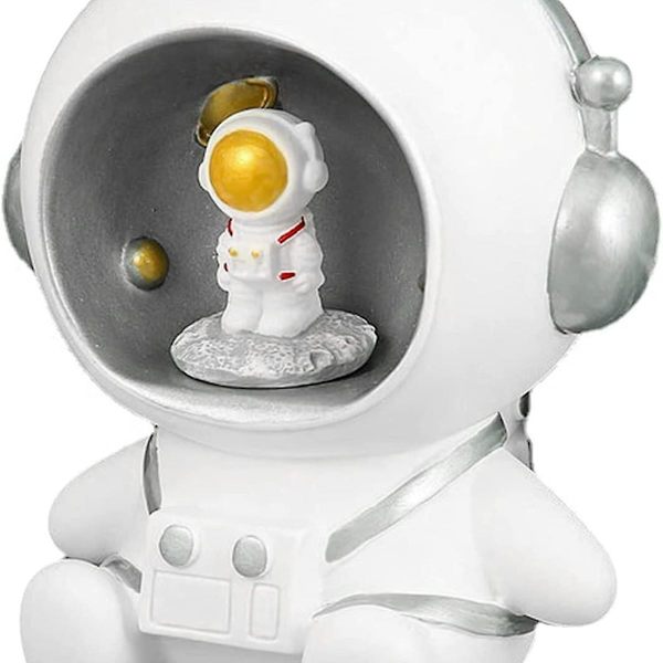 Astronauttihahmo koriste rahakassa raha