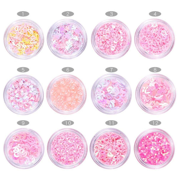 12 laatikkoa kynsien koristeluun tarkoitettuja glitter-paljetteja, jotka tekevät kynsistäsi kiiltävät ja värikkäät