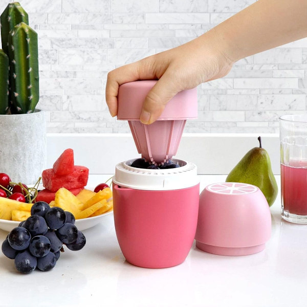 Håndpresser til citroner, citruspresser, unik citronpresser, pink
