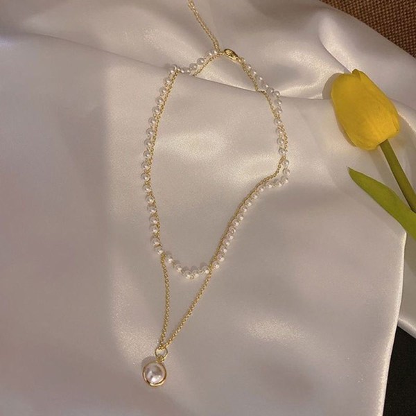 Feminint halsband med dubbla lager