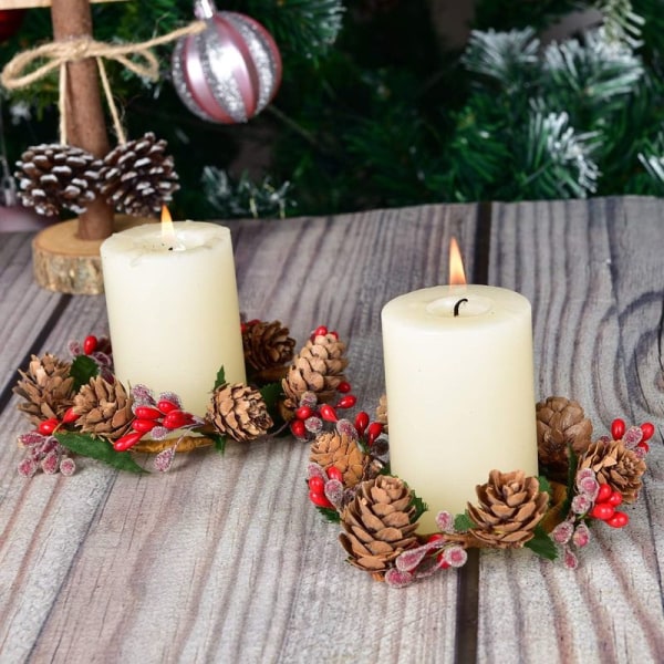 Stykke julelysestake med bærkonglelysring, dekorativt telys