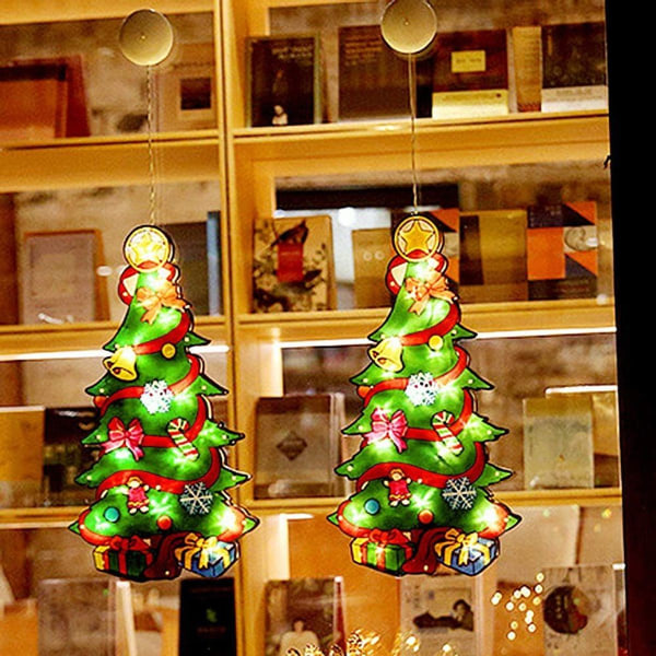 Joulukoristeen valaistu ikkuna, kaksipuoliset siluettivalot KLB:llä