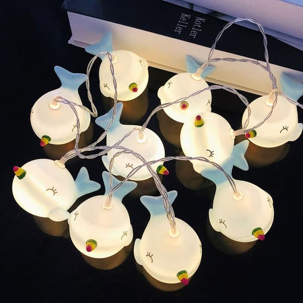 Blå plastfe-lys i form av en liten delfin med 10 LED-lys KLB