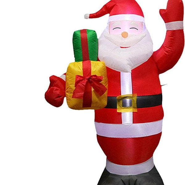 Uppblåsbara juldekorationer välkomnar jultomten med lampor, uppblåsbara