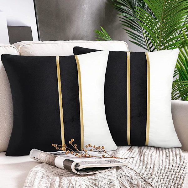 2 kappaleen tyynynpäällinen sohva musta tilkkutäkkikuvio neliö
