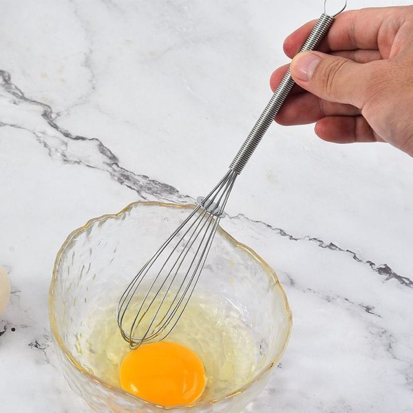 Piskeris i rustfrit stål, behageligt håndtag, let at piske æg