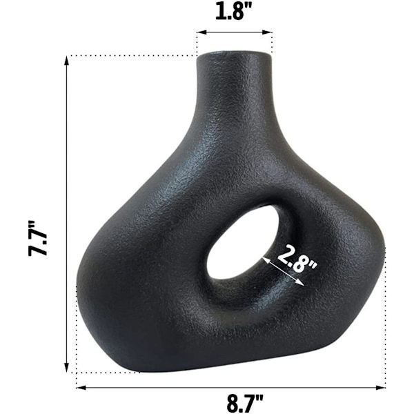 Cirkelsvas - matt svart geometrisk donutvas. Nordisk