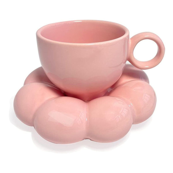Pink keramisk kaffekop med matchende service, blomst